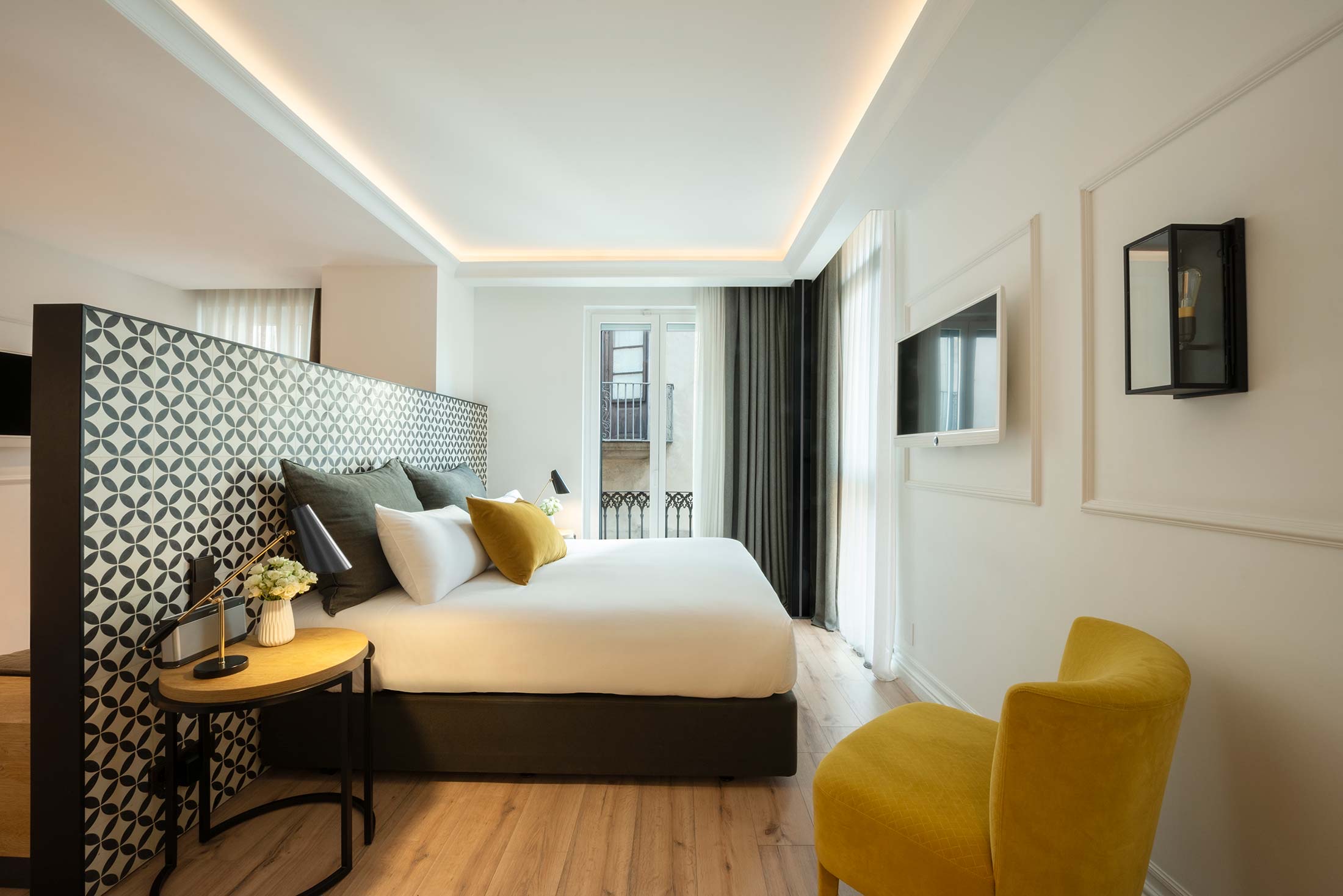 Hotel Serras Barcelona — detalle del acabado en espiga del parquet de la suite